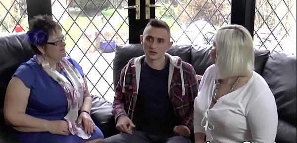  Big breasted GILFs enjoy steamy threesome with a young guy